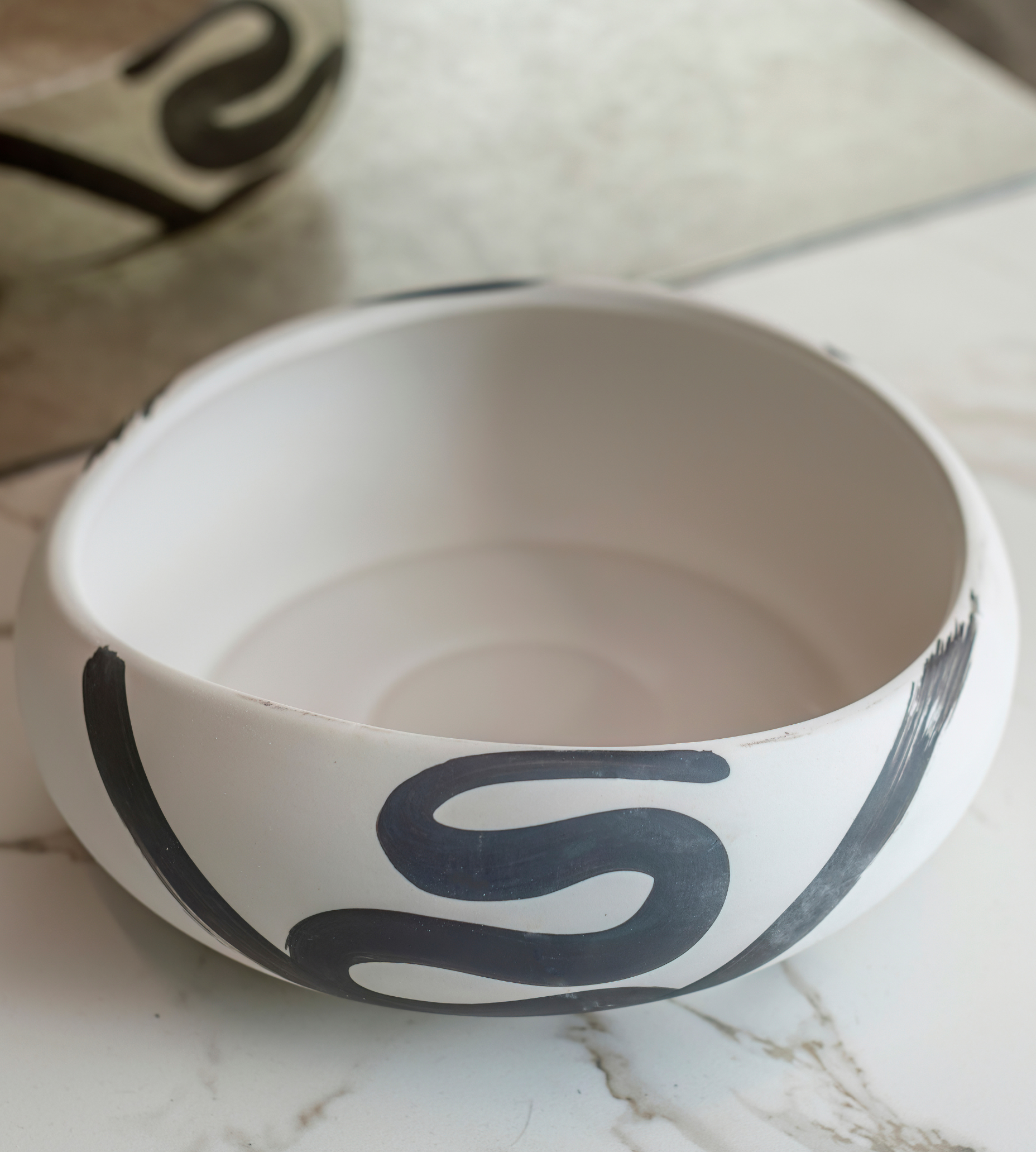 Black and Cream Ceramic Pot